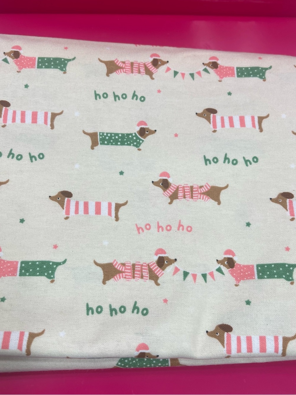 Joann Fabrics Super Snuggle Flannel in the Ho Ho Ho Dachshund design - Picture 2 of 2